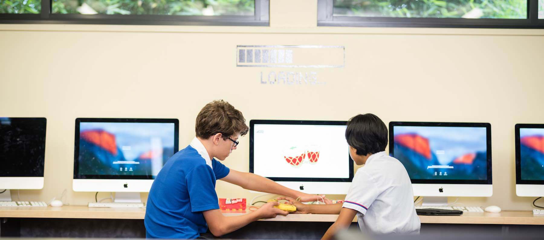 Students sitting at Hillbrook computer